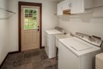 Mud room with washer, dryer and we provide the laundry detergent. 